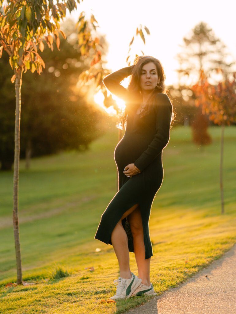 Maryam outdoors at sunset during a maternity portrait shoot in Hamilton