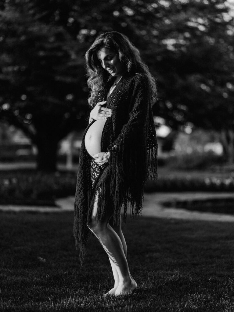 Maryam outdoors at sunset during a maternity portrait shoot in Hamilton