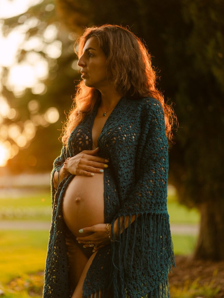 Maryam outdoors at sunset during a maternity portrait shoot in Hamilton