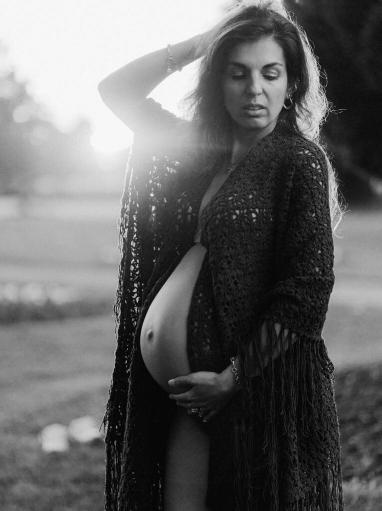Maryam outdoors at sunset during a maternity portrait shoot in Hamilton